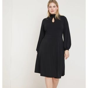Black knee length dress with tie back